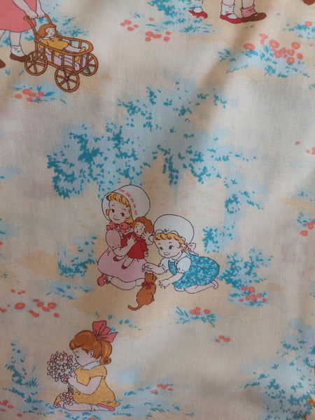Petit Marianne cotton fabric by Lecien 31035-11 scenic child print ivory yellow