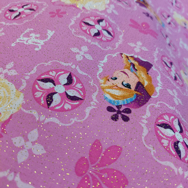 Disney cotton fabric by Springs Creative CP51872 Elsa and Ana Glittered Fabric